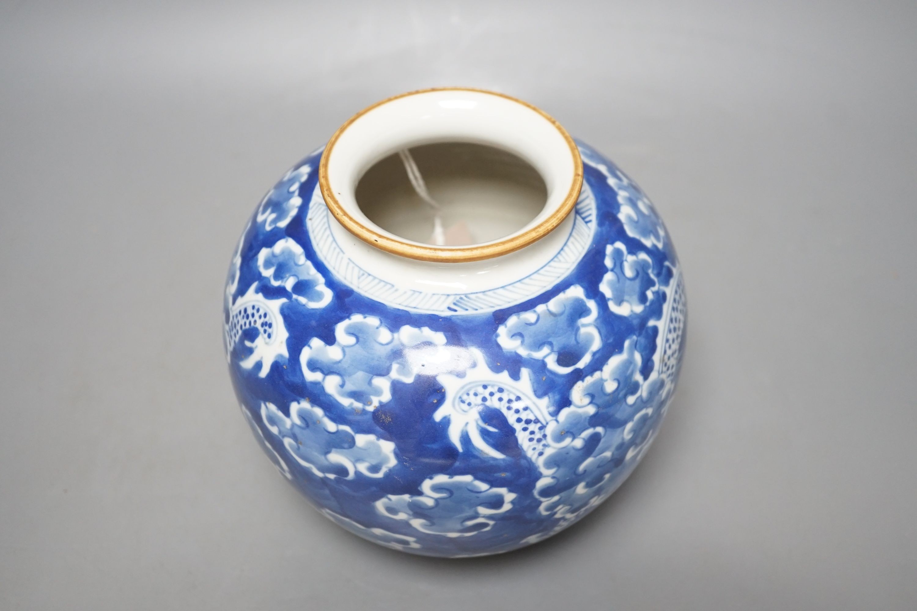 A Chinese blue and white ‘dragon’ globular vase, 17cms high.